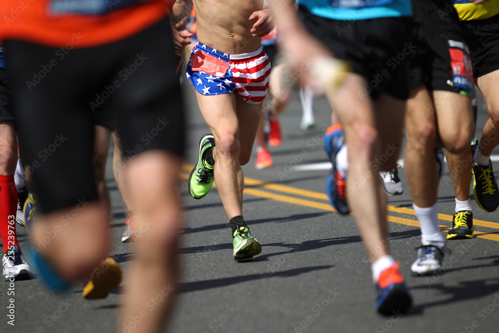 Runners run during Boston Marathon race